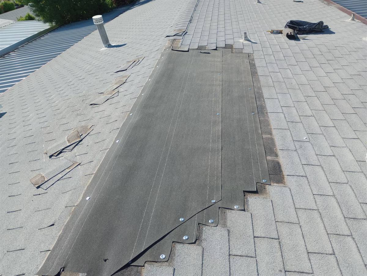 Shingle valley repair from a second angle, new underlayment ready