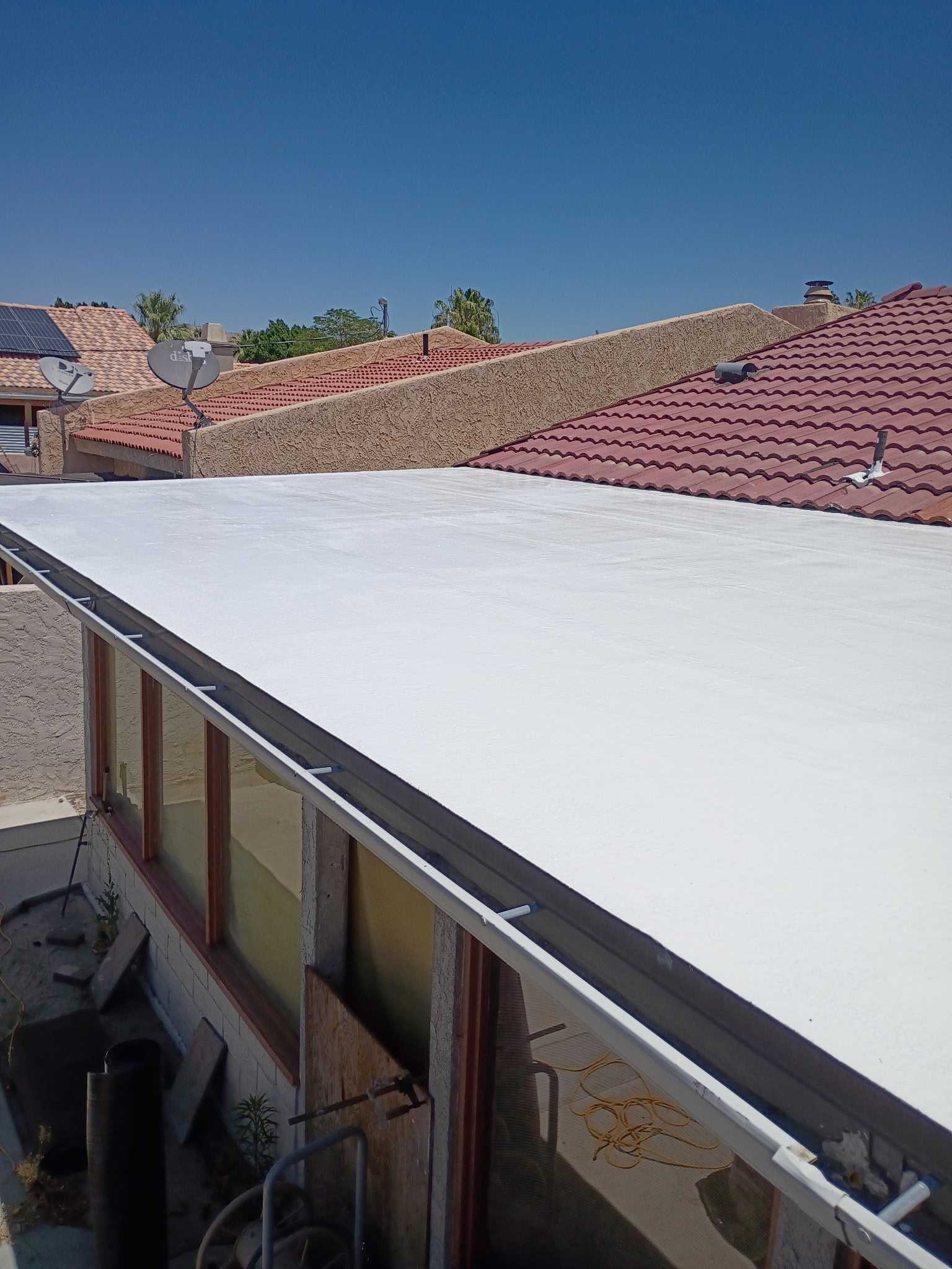 Silicone elastomeric roof coating finished on a Palm Springs home